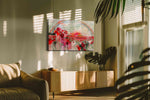 Crimson Bloom After the Storm poppy canvas wall art displayed above a sofa in a modern living room