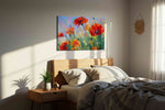 Crimson Poppies in Blue Haze poppy canvas wall art displayed above a bed in a styled bedroom scene