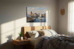 Harbor Light Reverie nautical canvas wall art displayed above a bed in a styled bedroom scene