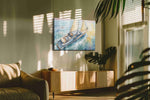 Sunwash Serenity Under Sail nautical canvas wall art displayed above a bed in a contemporary bedroom