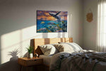 Sunfire Breach Symphony sea life canvas wall art displayed above a bed in a styled bedroom scene