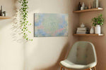 Pastel Bloom Vortex sunflower canvas wall art displayed above a bed in a contemporary bedroom