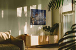 Florence After the Downpour urban canvas wall art displayed above a sofa in a modern living room