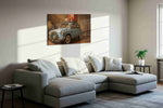 Yuletide Roadster Reverie vintage canvas wall art displayed above a sofa in a styled living room scene